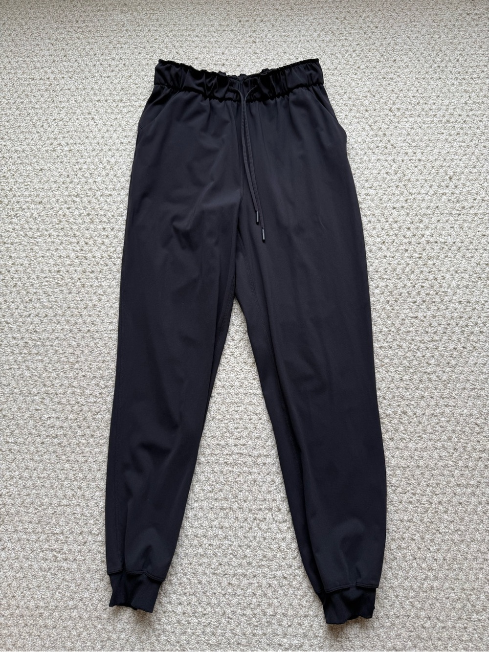 Lululemon Stretch High Rise Jogger size 6 in Black full length
